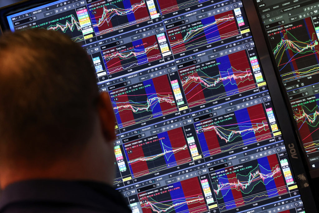 Wall Street rises to more records as Tesla vrooms higher