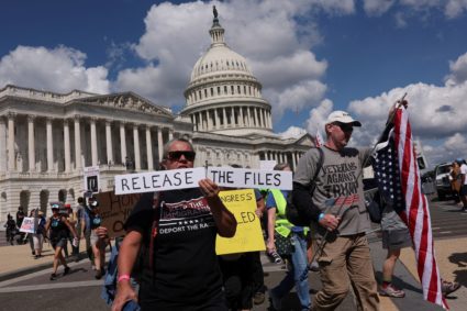 Anti-Trump protesters march at the U.S. Capitol in Washington