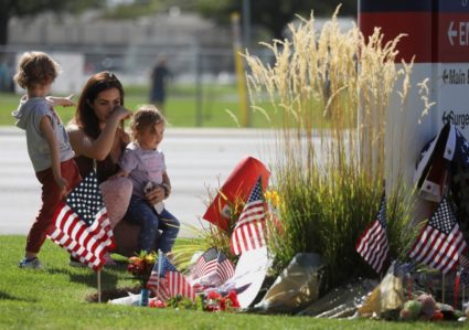 People mourn U.S. right-wing activist Kirk at a memorial at Orem's Timpanogos Regional Hospital