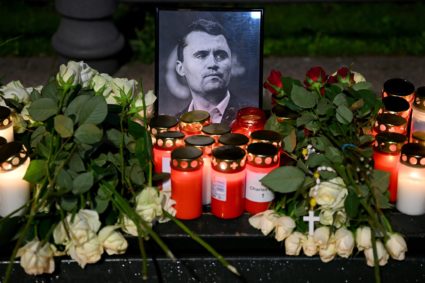 People gather to commemorate of Charlie Kirk in front of the Embassy of the United States in Berlin