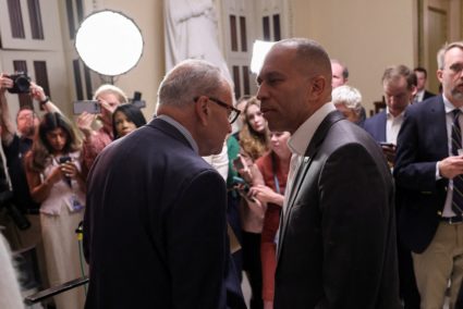 FILE PHOTO: U.S. House Minority Leader Jeffries and Senate Minority Leader Schumer speak to reporters at the U.S. Capitol ...