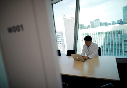 Medical doctor Makoto Kitada demonstrates a telemedicine application service called 'CLINICS', in Tokyo