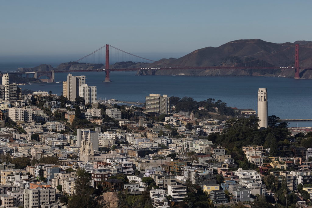 An aerial view of city of San Francisco skyline and the Golden Gate Bridge in California