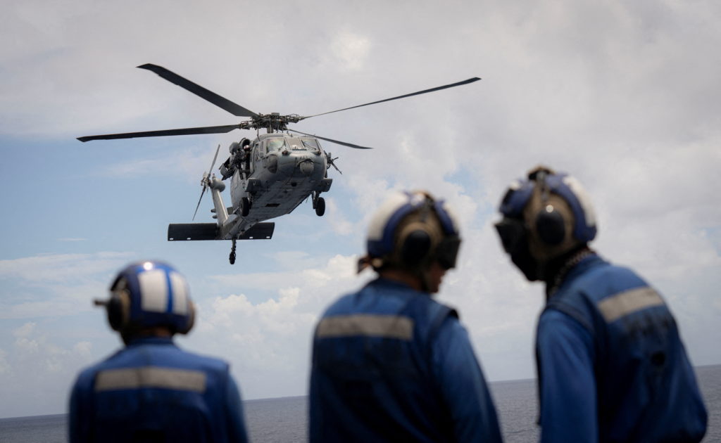 SH-60 helicopter lifts off from the U.S. Navy amphibious assault ship USS Iwo Jima in the Caribbean Sea