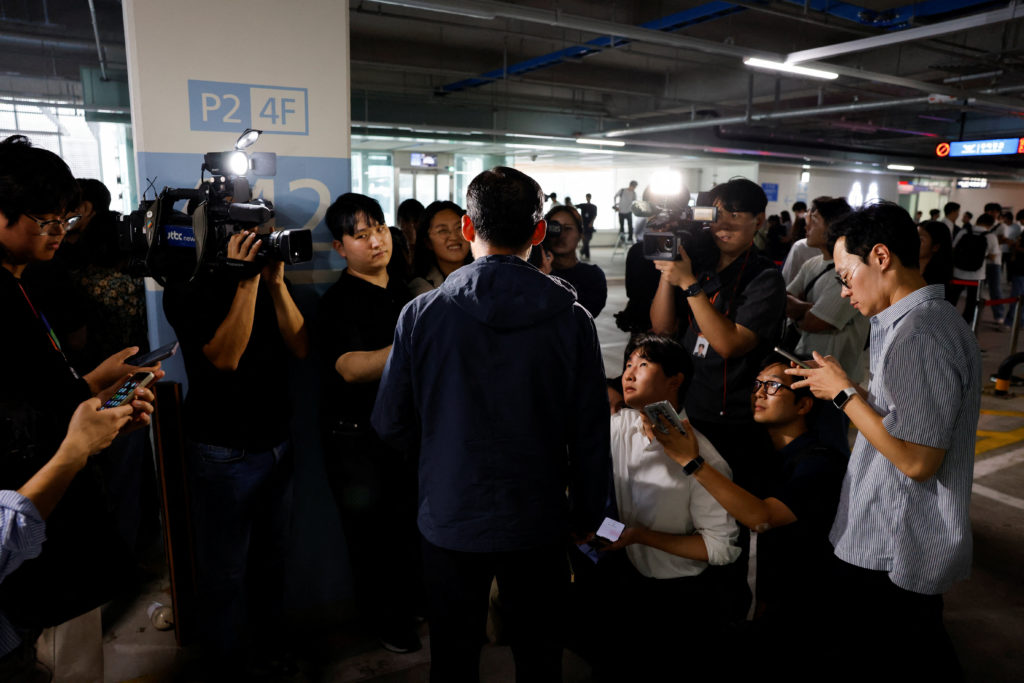 South Korean workers who were detained in an immigration raid in Georgia, arrive in Incheon