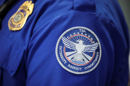 Transportation Security Administration (TSA) works during the first day of a partial U.S. government shutdown in Burbank