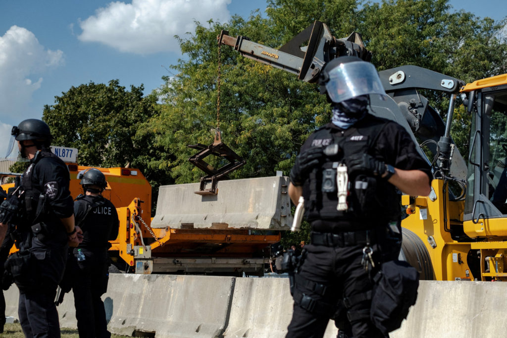 Concrete security barriers are placed near Broadview ICE facility after clashes with protesters