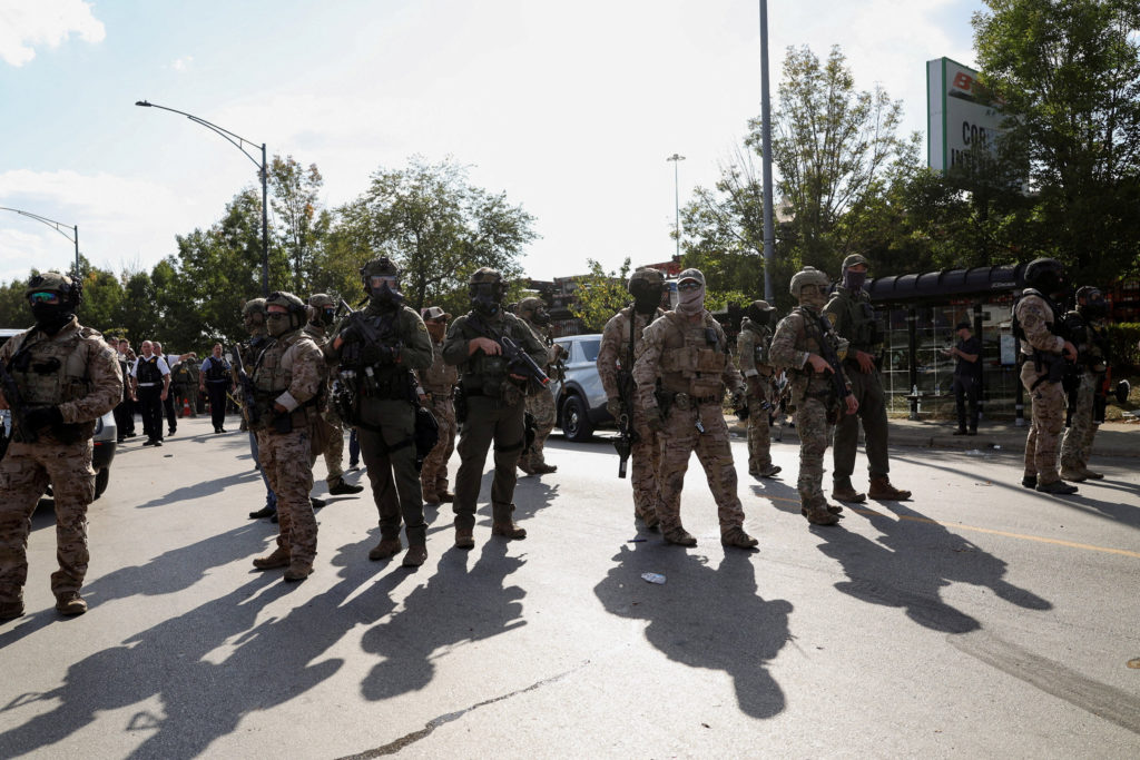 FILE PHOTO: People protest during a standoff with ICE and federal officers in Chicago