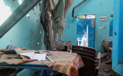 A desk bearing signs of shelling in a school where displaced people are sheltering, in El Fasher