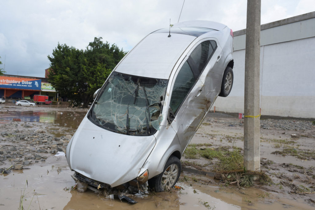 Torrential rains burst rivers, sparking floods in eastern Mexico