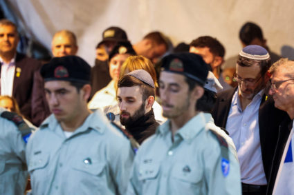 Released hostage attends funeral of Israeli soldier whose body was among those returned from Gaza
