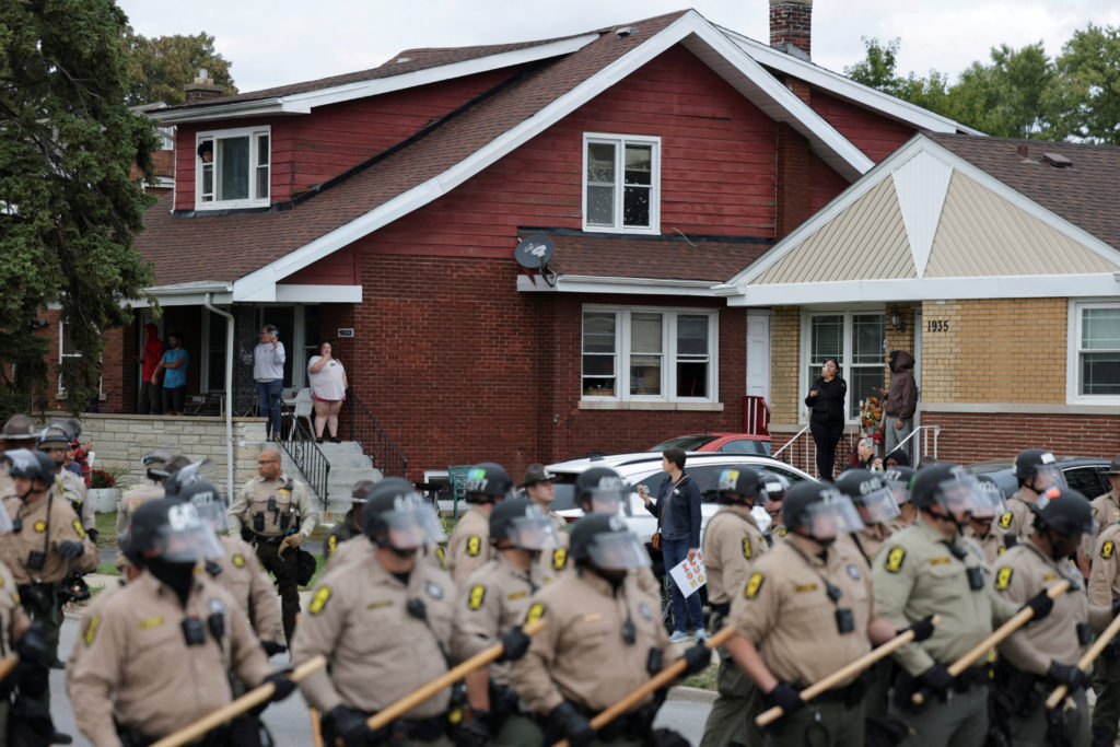 FILE PHOTO: People protest outside the U.S. Immigration and Customs Enforcement (ICE) Broadview facility in Chicago