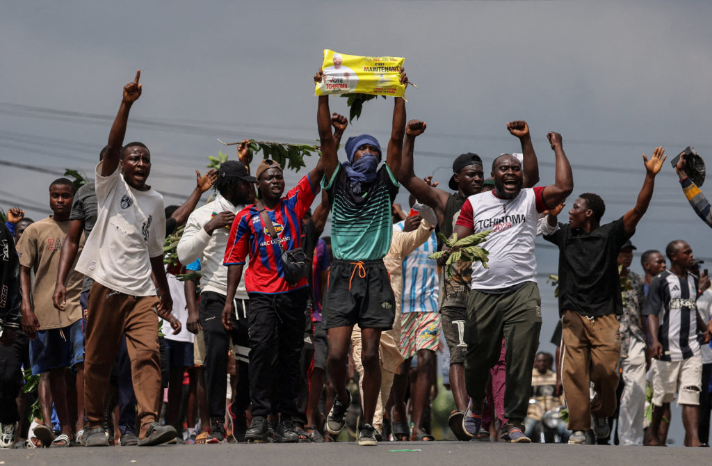 Supporters of Cameroonian presidential candidate Issa Tchiroma protest in Douala