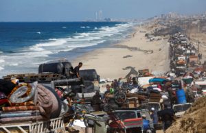 Palestinians flee northern Gaza due to an Israeli military operation, after Israeli forces ordered residents of Gaza City ...