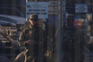National Guard members walk at U.S. ICE Broadview facility in Chicago, Illinois