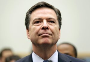 FBI Director James Comey arrives for a House Judiciary hearing on "The Encryption Tightrope: Balancing Americans' Security...