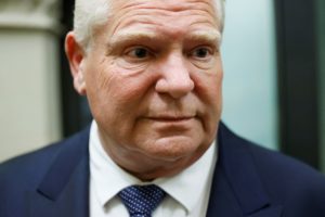 Ontario's Premier Doug Ford speaks with journalists after meeting with Canada's Prime Minister Mark Carney on Parliament H...