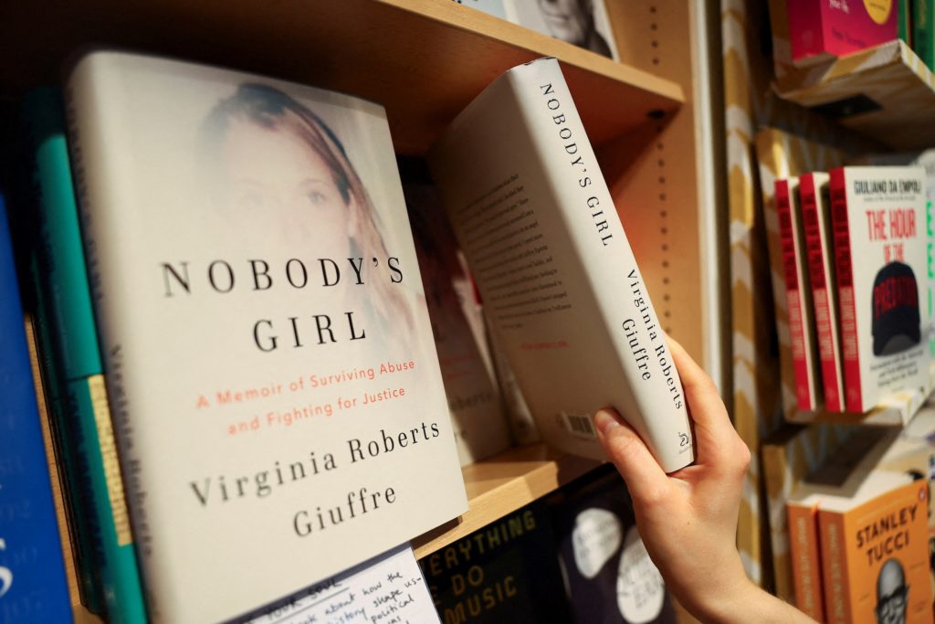 Copies of "Nobody's Girl: A Memoir of Surviving Abuse and Fighting for Justice", the posthumously published memoir by Virg...