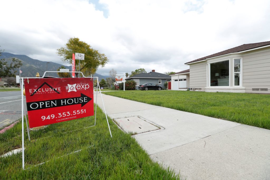 Sign advertising an open house in Pasadena is pictured during the coronavirus outbreak