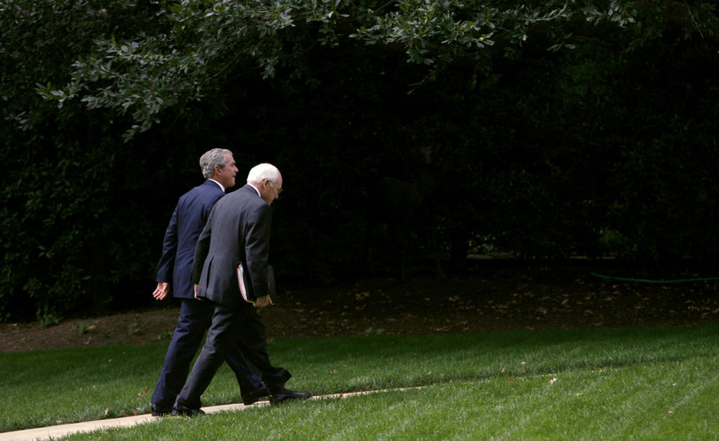 FILE PHOTO: President Bush and Cheney walk back to the Oval Office in Washington