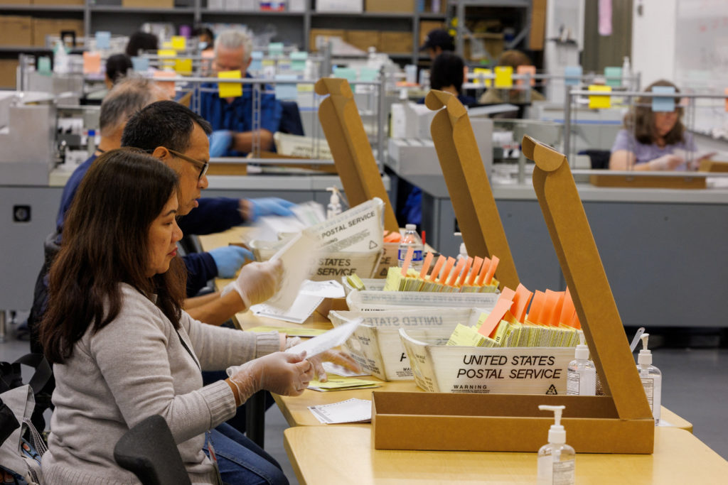 Proposition 50 ballots are counted on election day in Californian