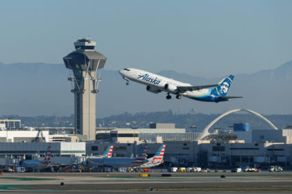 Commercial airliners take-off from Los Angeles International Airport