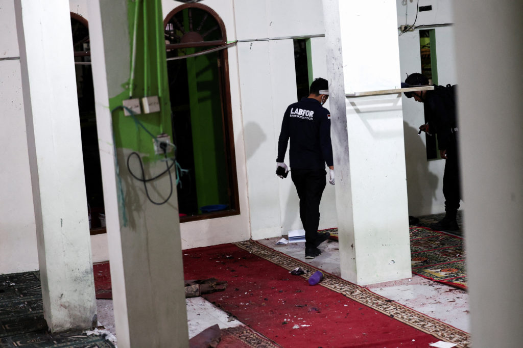 Explosions shake a mosque in an Indonesian high school