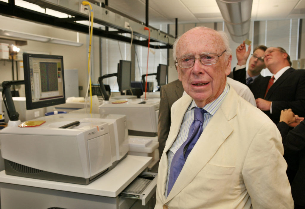 FILE PHOTO: Watson, co-discoverer of the DNA helix and father of the Human Genome Project, stands inside a laboratory at t...
