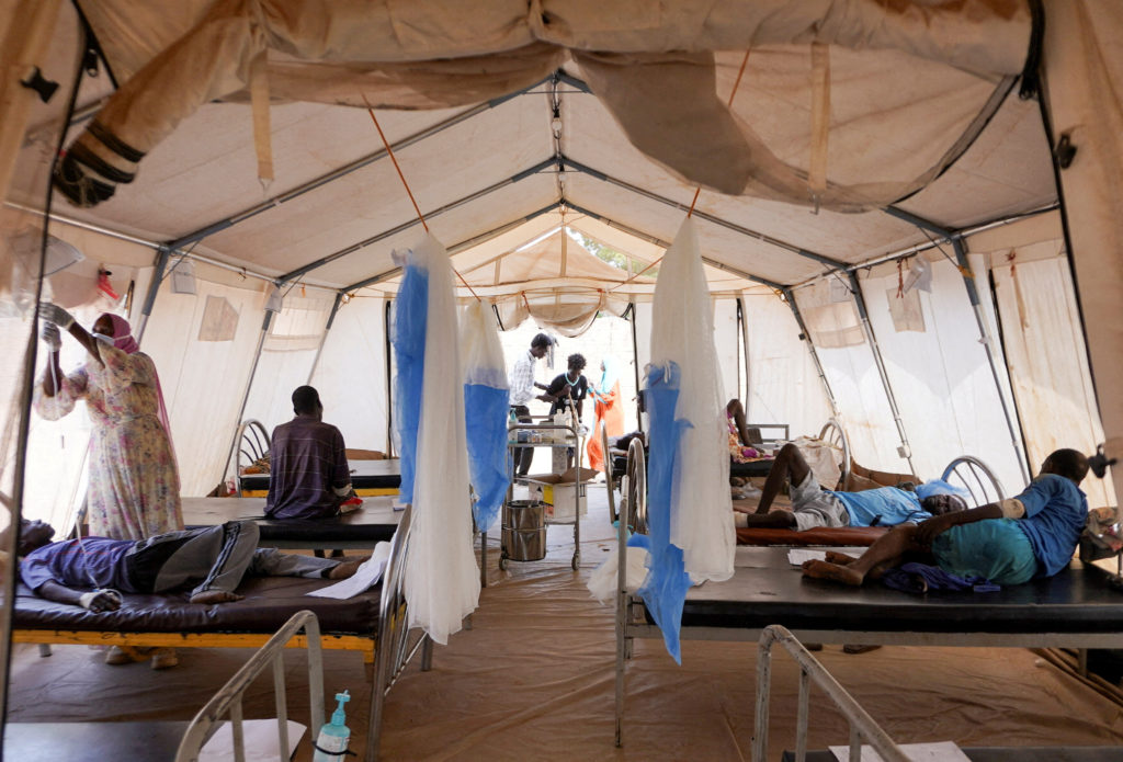 FILE PHOTO: Injured displaced Sudanese fleeing violence in al-Fashir and receiving treatment by Medecins Sans Frontieres (...
