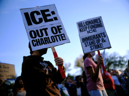 People protest as federal immigration authorities conduct raids in North Carolina