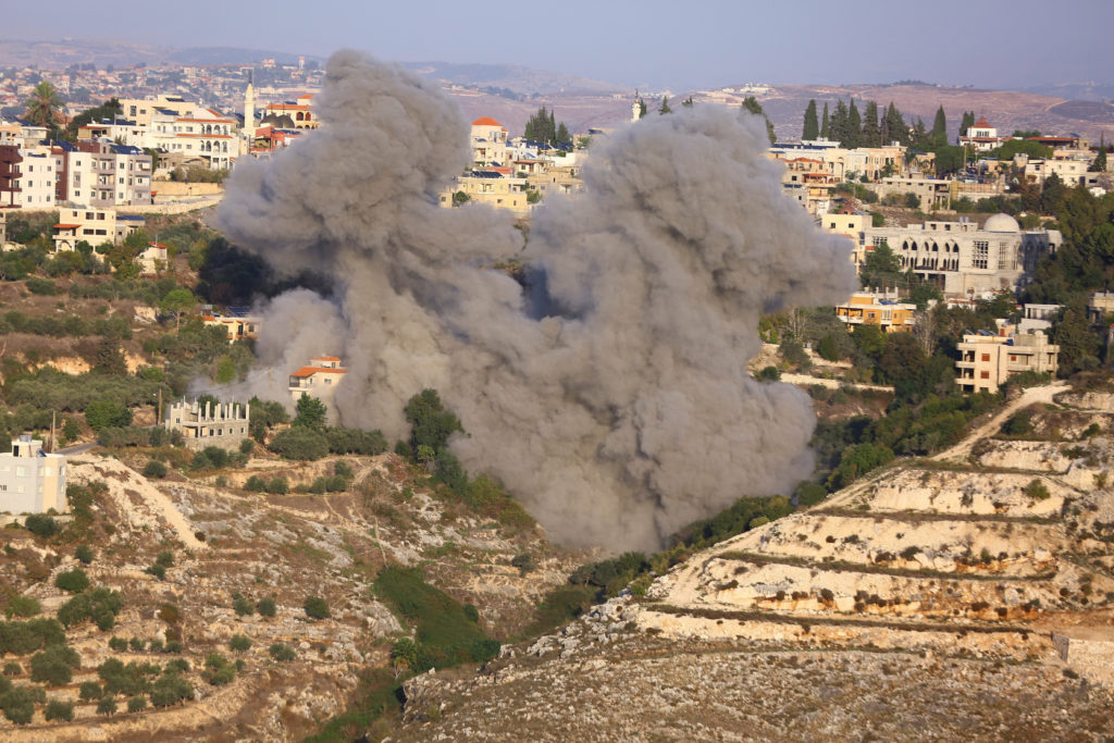 Smoke rises after Israeli strikes following Israeli military's evacuation orders, in Chehour