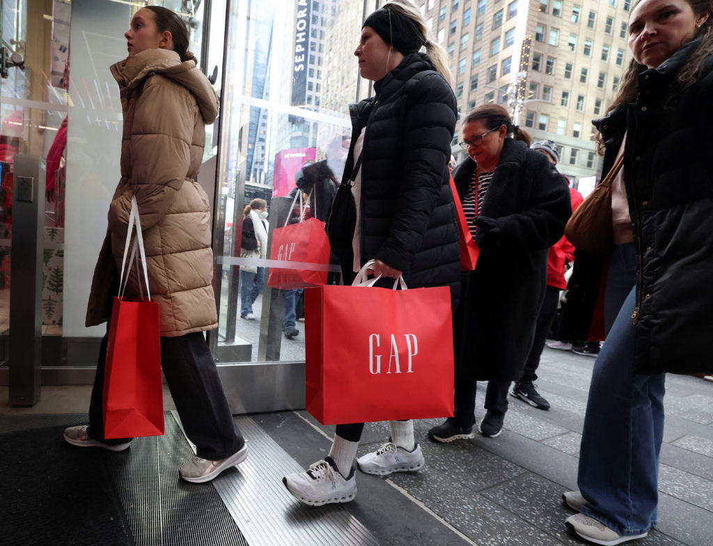 People shop ahead of Black Friday during Thanksgiving Day, in New York City