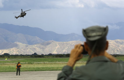People attend an aeronautical fair, as U.S. President Trump ramps up pressure on Venezuela’s government, in Maracay