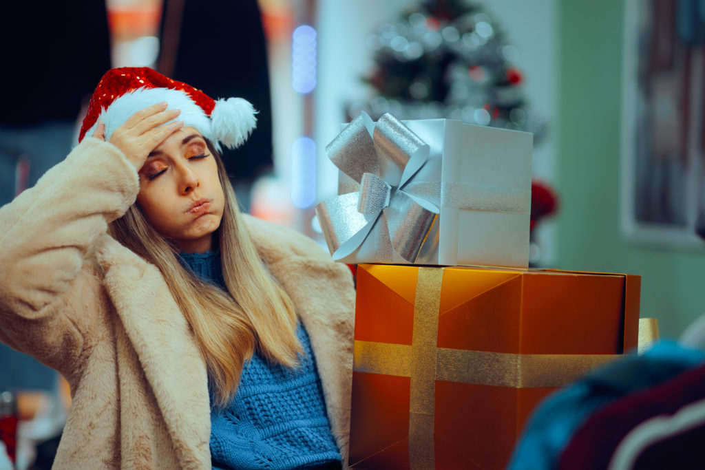 Stressed Christmas Woman Shopping in Fashion Store