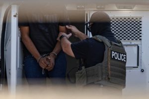 Federal agents unload detainees at the Broadview ICE detention center