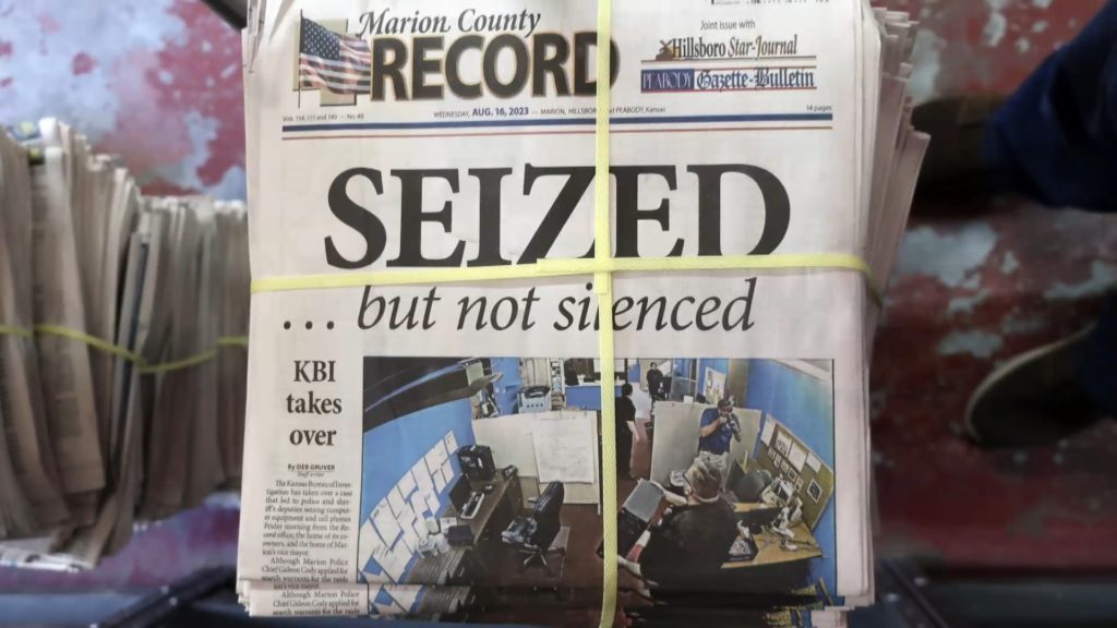 News Wrap: Kansas county to pay $3 million for police raid on newspaper