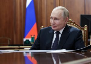 Russian President Putin meets Governor of Murmansk region Chibis in Moscow