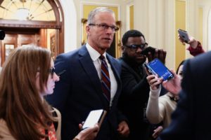 U.S. Senate Majority Leader John Thune (R-SD) speaks to reporters as he walks to the Senate floor, in Washington D.C.