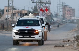FILE PHOTO: Red Cross transports body of hostage handed over by Hamas militants as part of Hamas-Israel ceasefire deal, in...