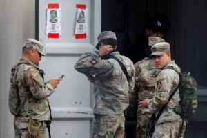 Members of the 49th Military Police Brigade from California at the Oregon Army National Guard's Camp Withycombe, in Happy ...