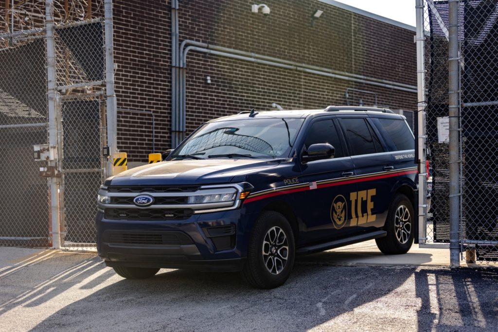 Federal agents unload detainees at the Broadview ICE detention center