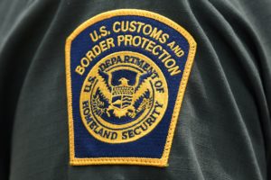 A U.S. Customs and Border Protection patch is seen on the arm of a U.S. Border Patrol agent in Mission