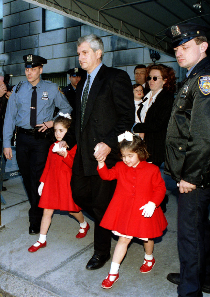 Edwin Schlossberg, husband of Jacqueline Kennedy Onassis's daughter Caroline, leads his daughters Ro..