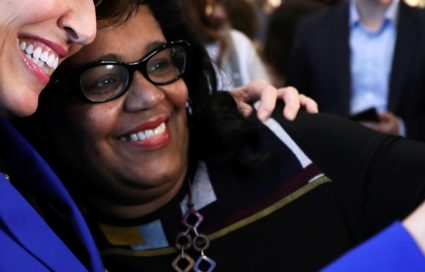 Democratic congressional candidate Cindy Axne (left) takes a photo with West Des Moines City Councilwoman Renee Hardman wh...