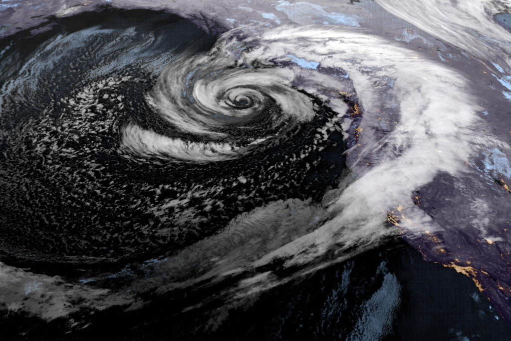 A low pressure storm system known as a "bomb cyclone" forms off the coast of the U.S. Pacific Northwest and western Canada