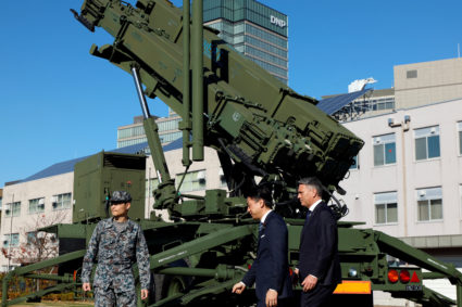 Japan's Cabinet approves record defense budget aiming to deter China as tensions grow