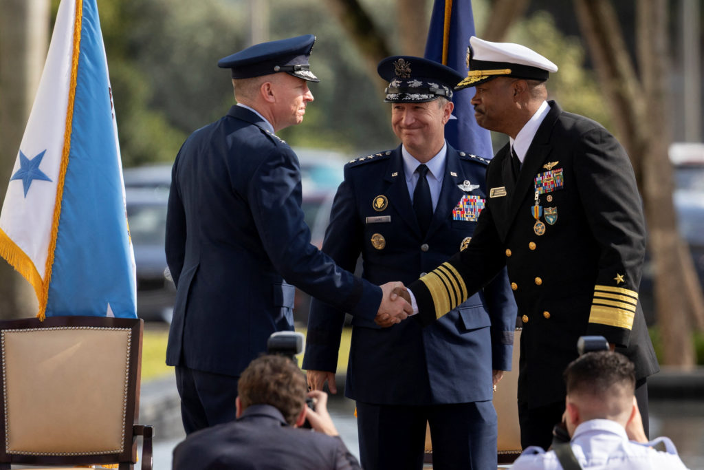 Navy Admiral Alvin Holsey relinquishes his duties as commander of U.S. Southern Command to Air Force Lt. Gen. Evan L. Pett...