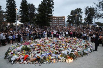 People pay respects at Bondi Pavilion to victims of a shooting during a Jewish holiday celebration at Bondi Beach, in Sydney