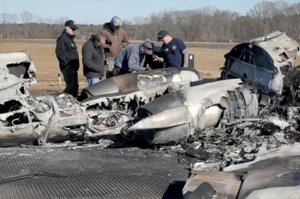 NTSB investigators view the wreckage of a Cessna 550 business jet after several people were killed in a crash in Statesville