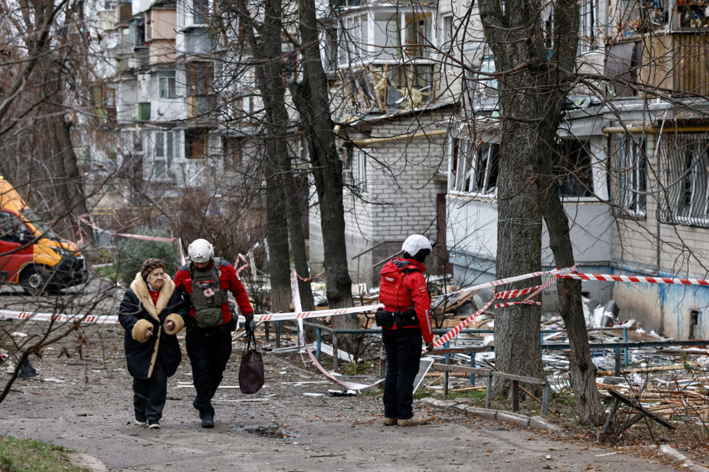 FILE PHOTO: Emergency responders work at the site of a Russian drone strike on an apartment building, in Kyiv